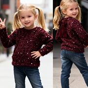 Chlupatý svetřík s flitry a mašlí bordo