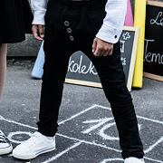 Černé kalhoty s knoflíky