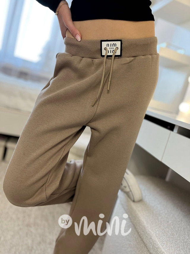 Zateplené volné tepláky se cvoky beige