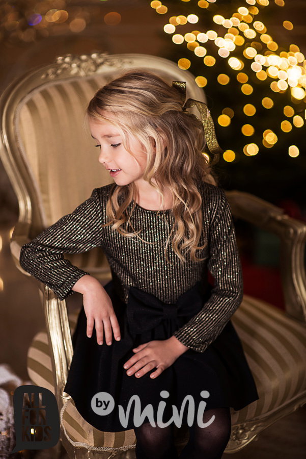 Černozlaté sváteční šaty s mašlí