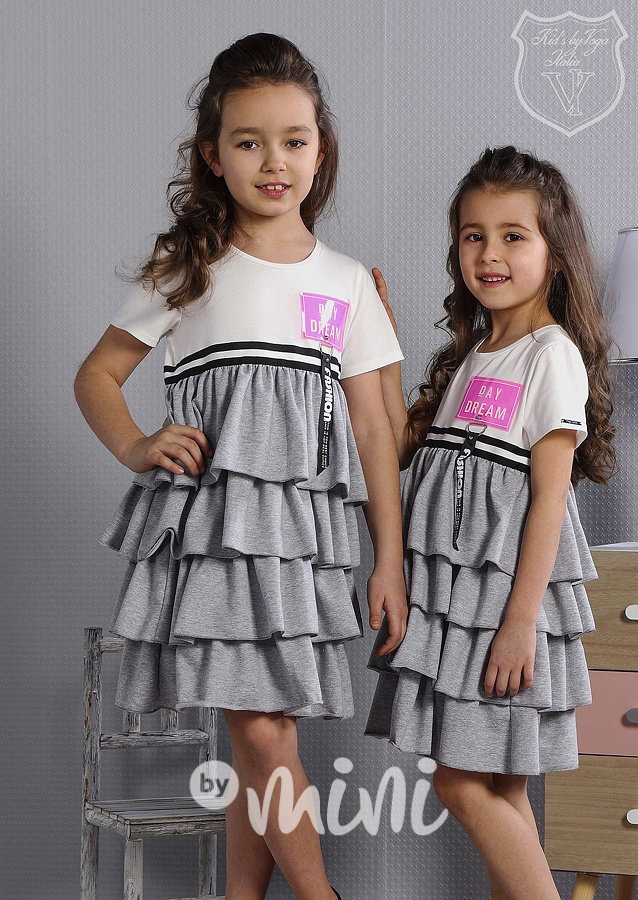 Designové šaty s volánky