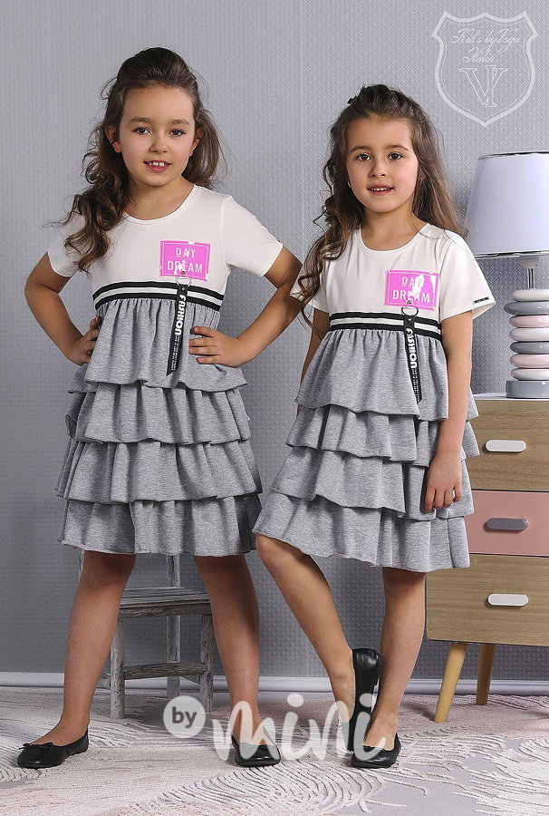 Designové šaty s volánky