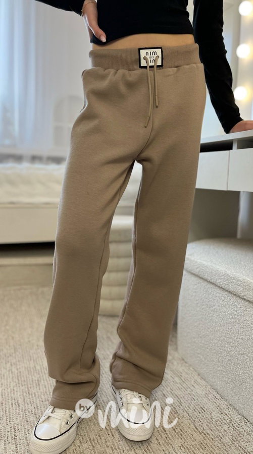 Zateplené volné tepláky se cvoky beige