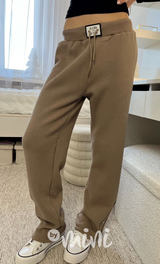 Zateplené volné tepláky se cvoky beige