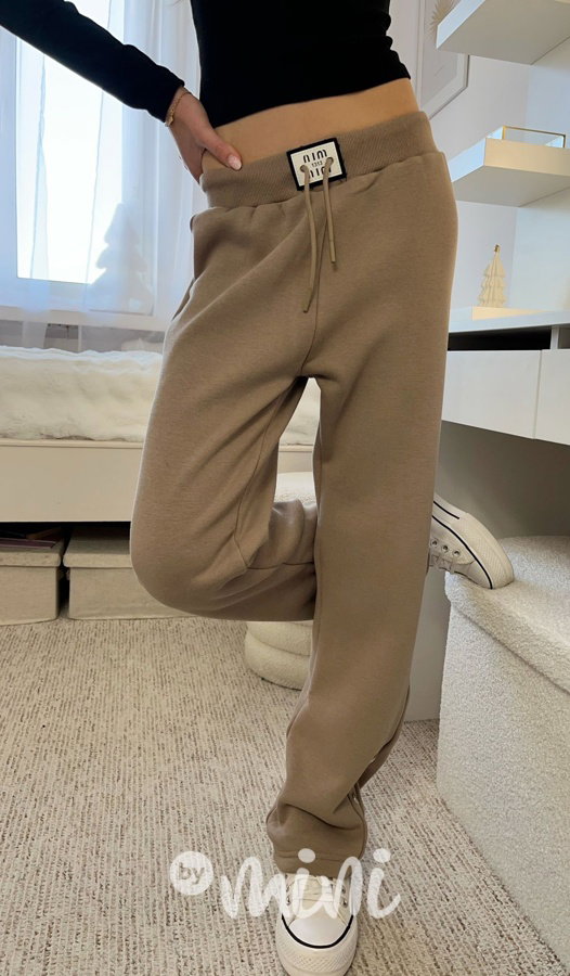 Zateplené volné tepláky se cvoky beige